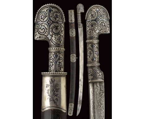 dating: late 19th Century provenance: Caucasia, Curved, single-edged blade with rear groove, featuring floral engravings at t