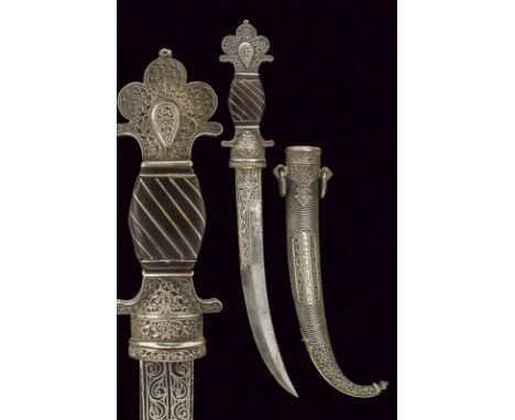 dating: early 20th Century provenance: Morocco, Curved, single-and half-edged blade, silver-inlaid with spirals at the base a