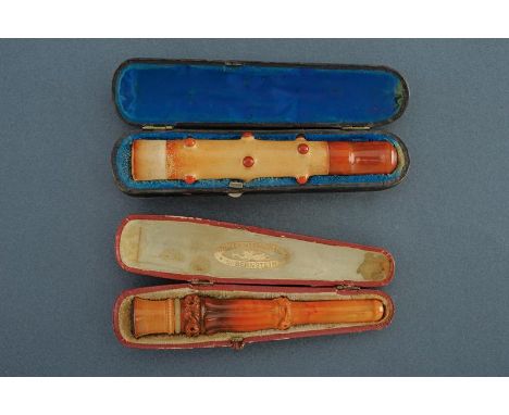 dating: First half of the 20th Century provenance: Europe, Both in sea foam and amber, one embossed with floral motifs, one w