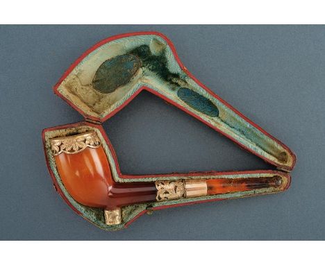 dating: first quarter of the 20th Century provenance: Europe, In sea foam and amber, with gold-plated, metal mounts, partiall