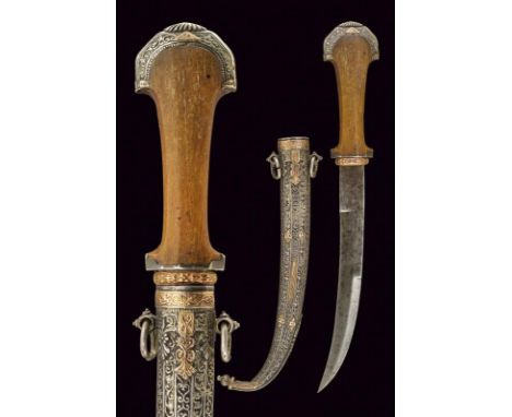 dating: first quarter of the 20th Century provenance: Morocco, Typical, single-and false-edged blade. Horn grip with silver m