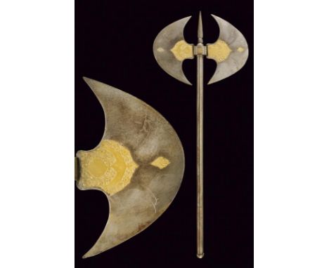 dating: 19th Century provenance: Indopersia, Double, strongly convex-edged axe, chiselled with gilded floral motifs. Block de