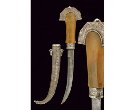 dating: first quarter of the 20th Century provenance: Morocco, Curved, single-and half-edged blade with traces of engravings.