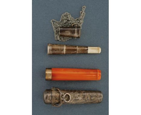 dating: First half of the 20th Century provenance: England, One in amber with gilded, silver ring and stamped. In a silver ca