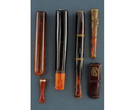 dating: First half of the 20th Century provenance: Europe, All different, in amber and other materials, four with metal mount