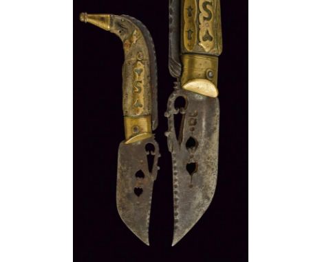 dating: 19th Century provenance: Italy, Wide, single-edged blade, pierced in a heart shape. Angled grip with horn grip scales