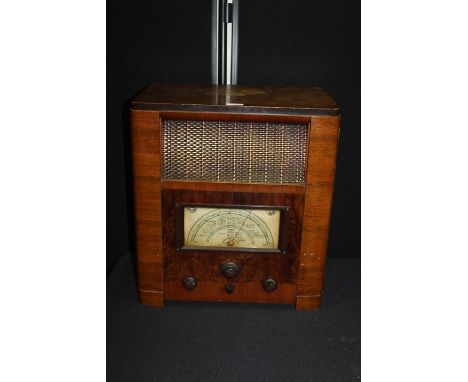 Radio housed with in a wooden case, with internal speaker, 