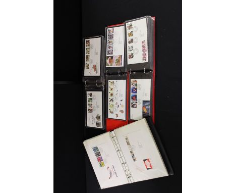 Four albums of first day covers.