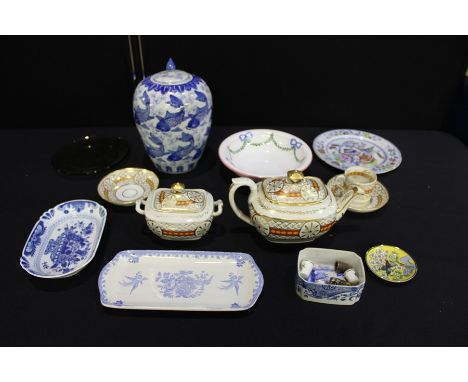 Porcelain to include 19th Century teapot, covered sugar bowl, tea cup and two saucers, Oriental vase and cover with koi carp 