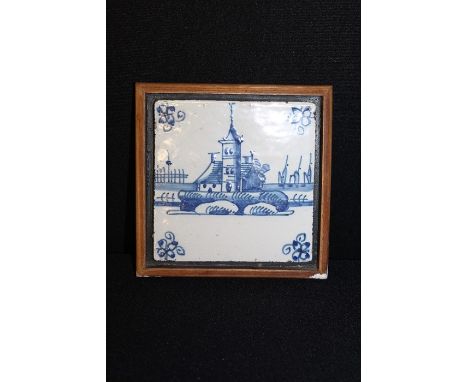 18th Century Delft tile, painted in blue of a church, the tile mounted to a frame