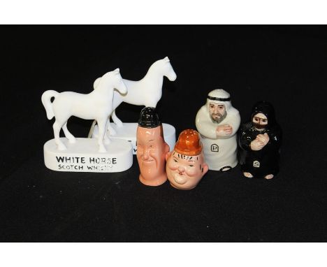 Beswick Laurel and Hardy salt and pepper pots, salt and pepper pot modelled as a Middle Eastern man and woman, pair of White 