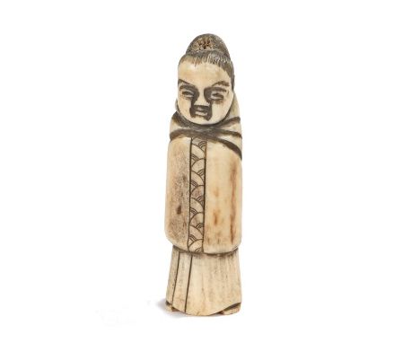 Japanese Meiji period netsuke, the bone netsuke depicting a standing man in full length robes, 7cm high