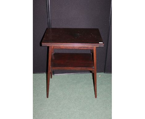 Edwardian mahogany card table, with rectangular folding top opening to reveal a green baize lined playing surface with gilt t