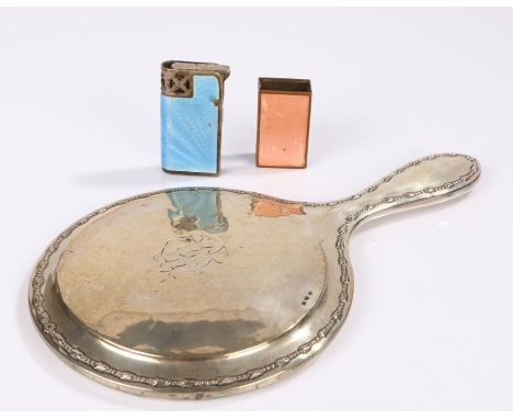 Silver handled hand mirror, blue enamel decorated cigarette lighter, puce enamel decorated matchbox holder (3)