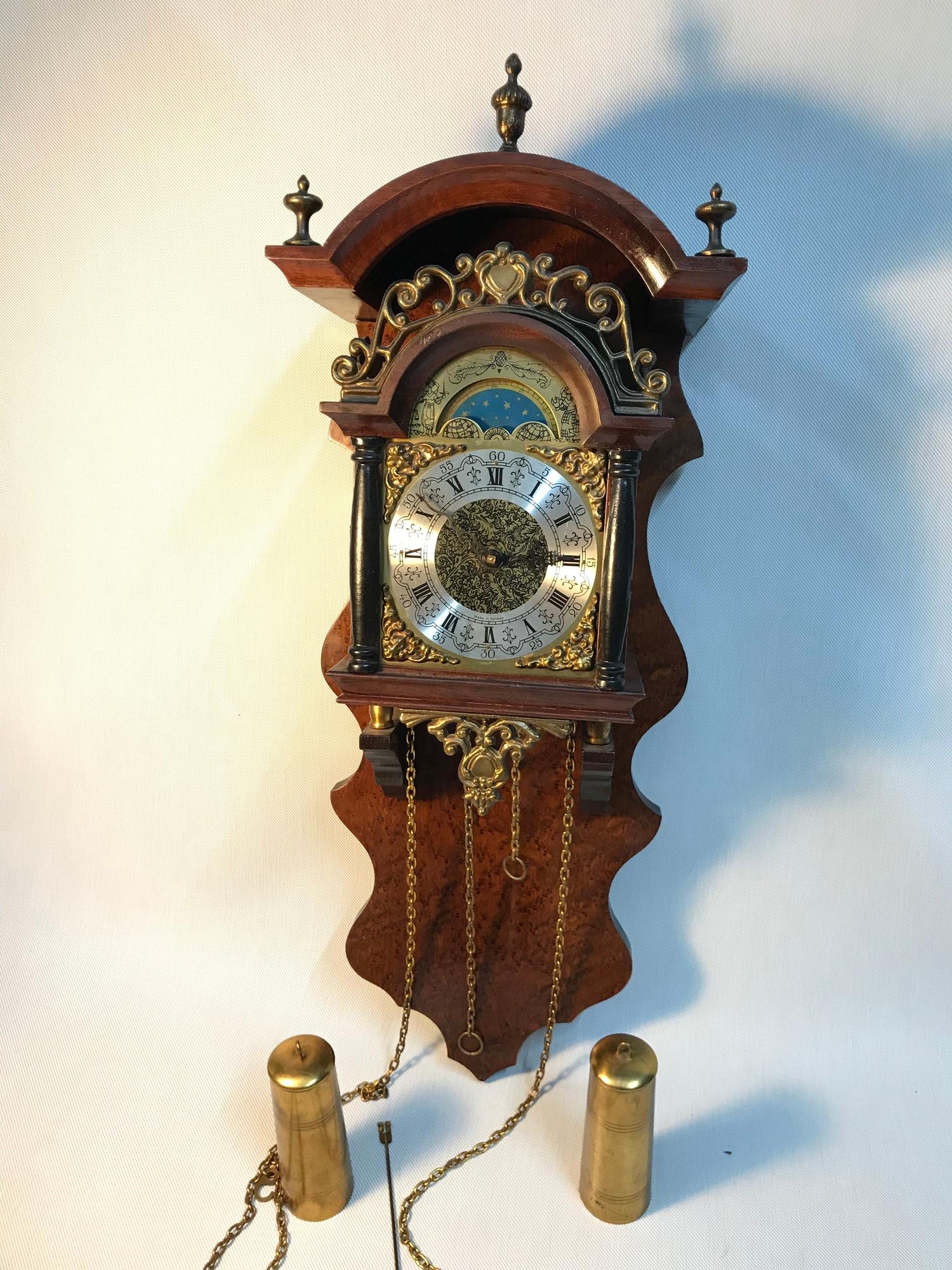 A Reproduction Dutch wall clock produced by United Clock Works made in