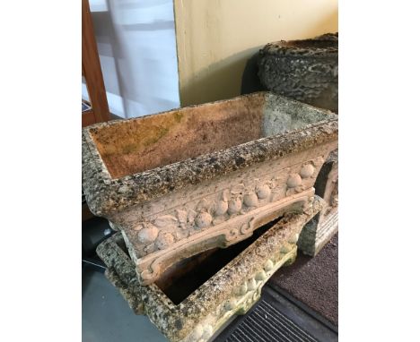 A Large heavy garden trough style planter, Detailed with fruit and leaf designs 