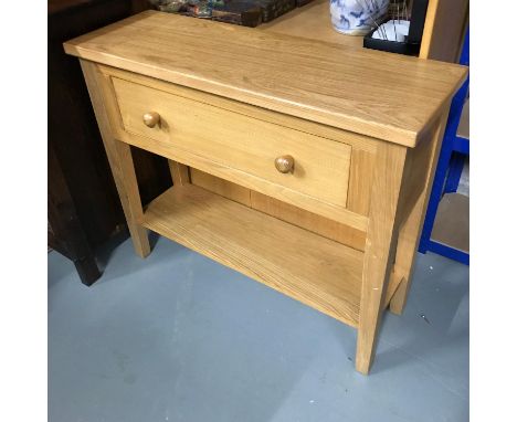 A Solid light oak contemporary one drawer console table, Measures 75x90x31cm 