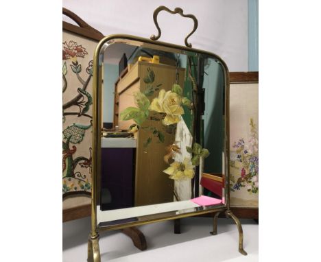 A lot of two hand stitched and wooden surround firescreens together with a brass and mirror firescreen 