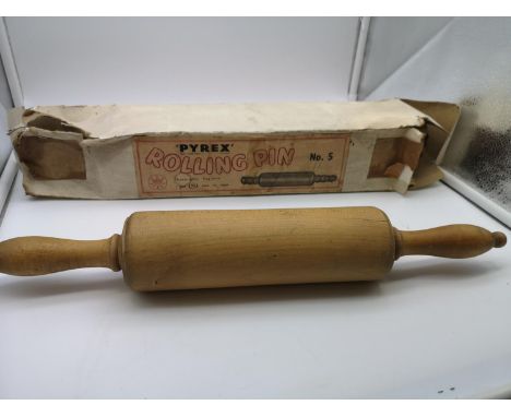 Pyrex glass rolling pin with cork stopper end and original box, together with a wooden rolling pin 