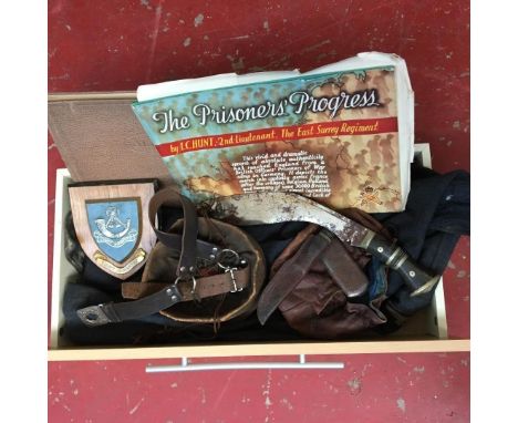 A Box of military collectables which includes R.A.F Jacket, Gurkha knife, Girls Guide belt and two vintage leather purse bags