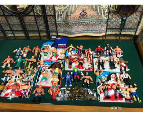 A Collection of WWF Hasbro Vintage wrestling figures 38 in total, Includes WCW Sound bar working, WCW Belts, Figures includes