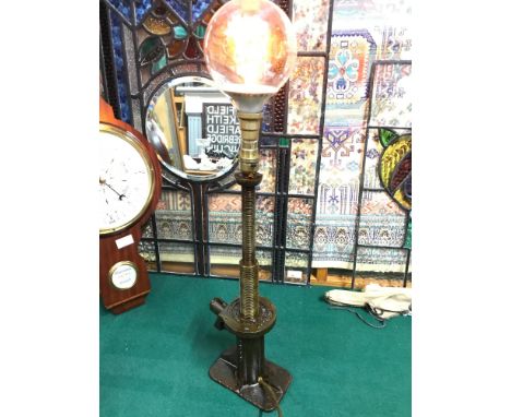 A Vintage Shelley double lift Jack converted to a side lamp. Very unique and stylish. Has a varnish to give it an oil wet loo