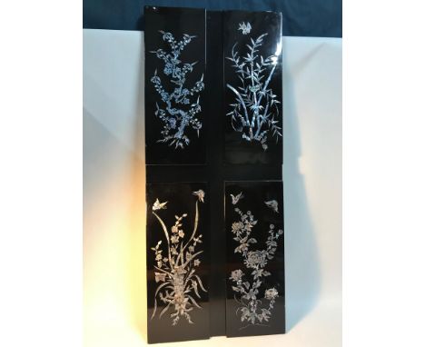 A Vintage Chinese lacquered and mother of pearl detail wall screen. Measures 103x43.5cm 