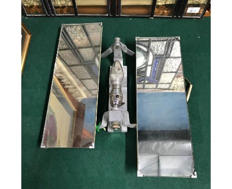 An Art Deco wall mounted light fitting with angle poise double mirror fitment. 
