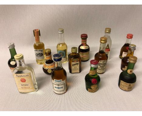 A collection of mixed miniatures to include Southern Comfort, Drambuie, Gilbey's Gin, Cointreau, Appleton White, Martell Coig