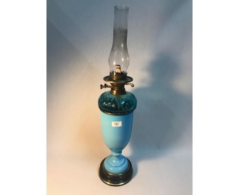 A Victorian two section blue glass paraffin lamp, Measures 71cm in height 
