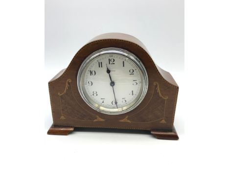 An Edwardian French 8 day mantel clock. Detailed with inlays, Has a drum movement. In a working condition. 