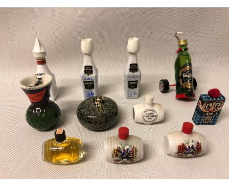 A collection of mixed novelty miniatures to include Vandermint Liquer, Glenfiddich whisky, Rutherford's whisky, Beneagles Sco