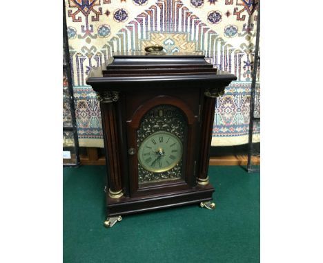 A Reproduction mantel clock. Measures 31cm in height 