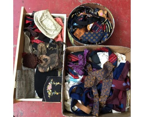 A Lot of vintage fashion accessories which includes silk ties, ladies clutch bags and vintage gloves. 