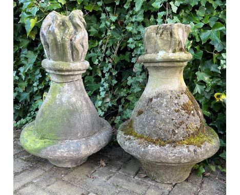 A pair of 17th century architectural conical flame roof finials, hand carved in limestone, 84 and 75cm high (2)**Please note 