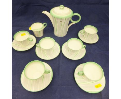 A Shelley coffee service for six place settings to include coffee pot, milk jug, six cups and saucers decorated with a wavy s