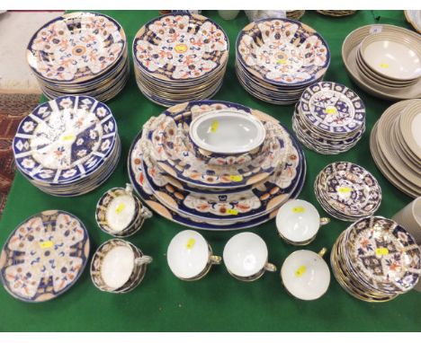 A large collection of ironstone china dinner and tea wares decorated in the Imari palette, to include Ashworth China, B R & C