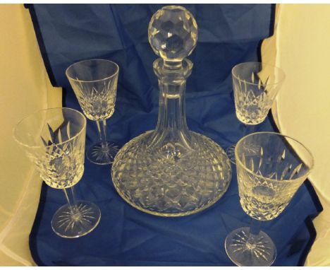 A set of ten Waterford Crystal presentation wines with bell-shaped bowls on a faceted stem, with star cut bases, together wit