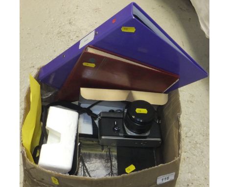 A Minolta XE-5 camera, a Nikon F-501 camera, Nikon F AF zoom lens, various handbooks other various cameras etc and two stamp 