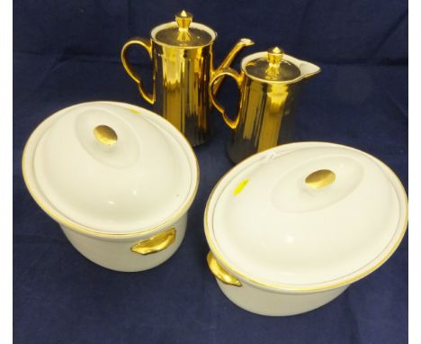 A pair or Royal Worcester lidded tureens with gilt highlighting on a white ground, two Royal Worcester gilt ground coffee pot