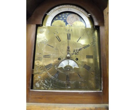 A circa 1800 oak and inlaid cased long case clock, the eight day movement with brass arched dial and sun and moon phase, surm