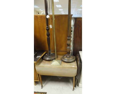 An Edwardian mahogany Pembroke table, together with a small oak folding table, two mahogany standard lamps and a brass standa