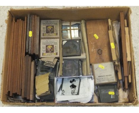 A box containing various magic lantern slides