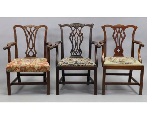 An early-mid 19th century mahogany Chippendale-style elbow dining chair, with carved decoration to the pierced splat back, pa