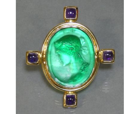 An Elizabeth Locke 18K brooch set oval Venetian green glass cameo of a classical female bust, four protruding amethyst caboch