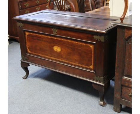 A 19th century inlaid mahogany &amp; brass mounted trunk with original hinged to the fielded panel lid, heavy brass side hand