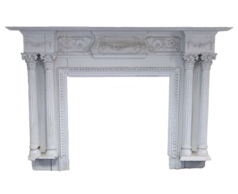 A 19th century white-painted carved pine fire surround, the mantelpiece with moulded edge above floral swags to the frieze, h