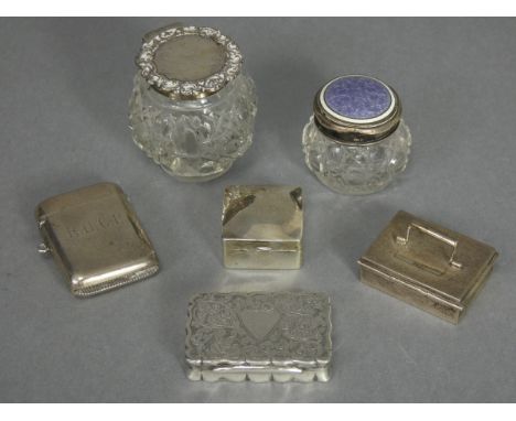 An Edwardian silver rectangular snuff box with engraved scroll decoration, shaped sides, &amp; hinged lid, 2” wide, Birmingha