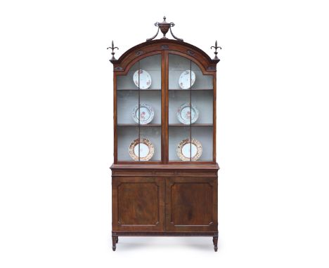 A LATE 18th CENTURY SHERATON PERIOD MAHOGANY GLAZED BOOKCASE, with classical urn, swag &amp; foliate pediments to the arched 