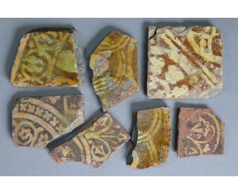 A medieval pottery slip-decorated 4½” square tile (w.a.f.); &amp;   six ditto tile fragments.